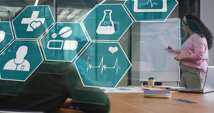 Animation of medical icons over diverse business people in office