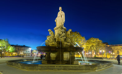 Image of Fontaine Pradier in Nimes at night illuminated, France.