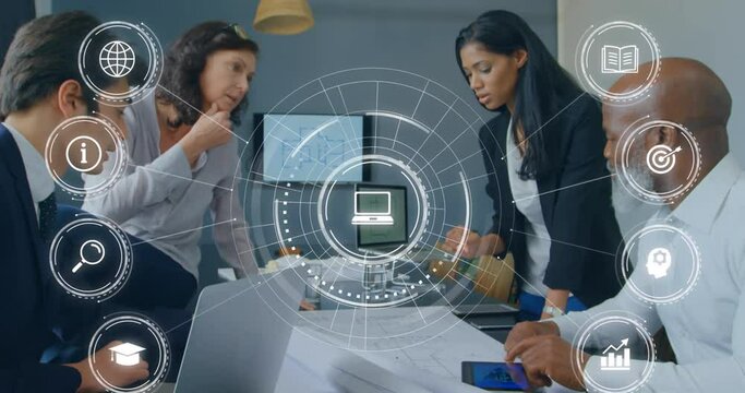Animation of multiple digital icons against diverse businesspeople discussing over a plan at office