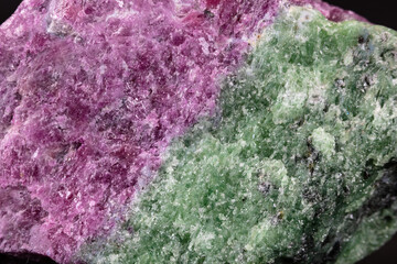 Closeup Ruby Zoisite (Anyolite), mined in Tanzania. Red Ruby, Green Zoisite, and black parasite visible.  
