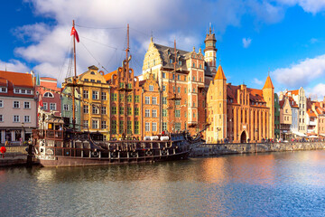 Fototapeta na wymiar Panorama of Old Town with Old harbour crane and city gate Zuraw and Motlawa River, Gdansk, Poland