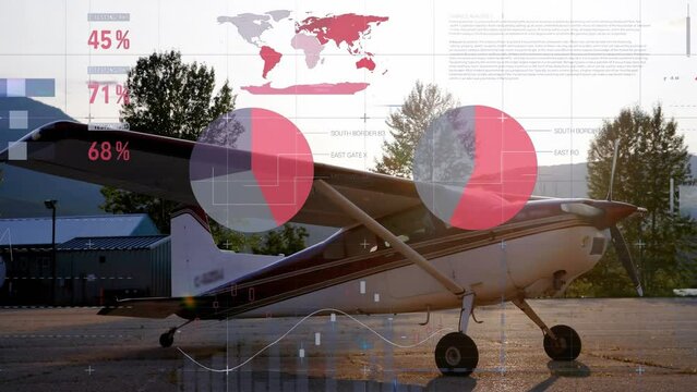 Animation of infographic interface over parked glider airplane in airport