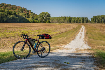 gravel touring bike on Steamboat Trace Trail converted from old railroad running across farmland...