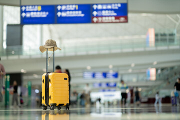 The suitcases in an empty airport hall, traveler cases in the departure airport terminal waiting...