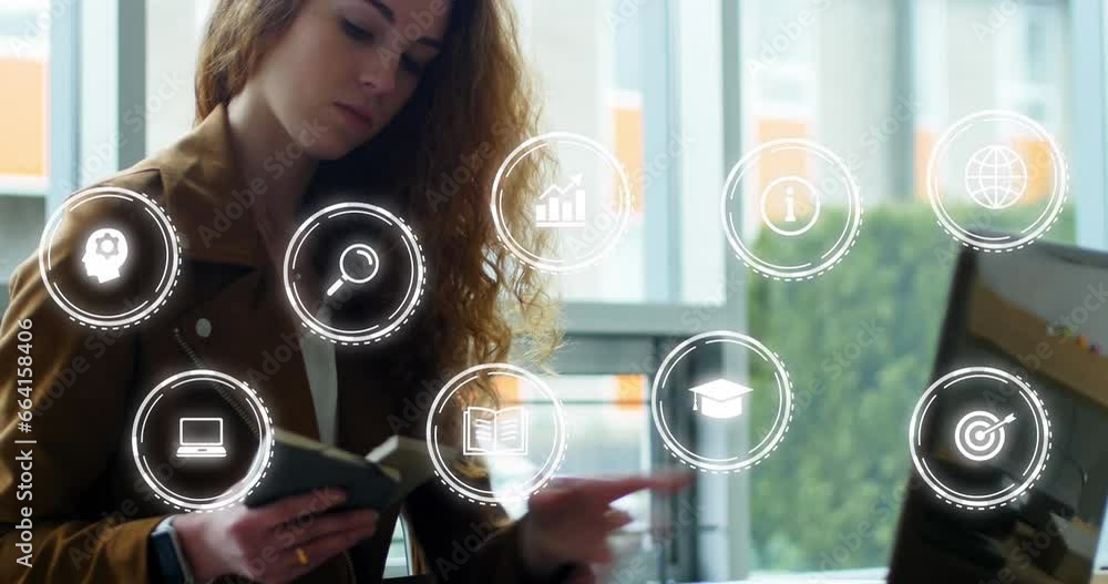 Aufkleber animation of multiple icons in circles over caucasian woman using laptop while reading book