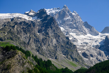 La Grave La Meije Ski off-piste resort, unique in Alps with single groomed slope on the glacier, freeride, view on peak La Meije, Massif des Ecrins, Hautes Alpes, France in summer