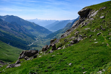 Obraz premium Mountains and alpine meadows views near Col du Lautaret, Massif des Ecrins, Hautes Alpes, France in summer