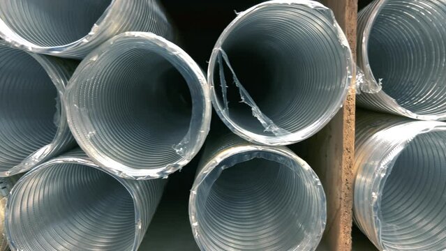 Corrugated Steel Pipes (CSP), or Corrugated Metal Pipes (CMP) on a hardware store or warehouse shelf