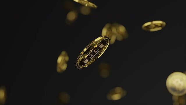 Bitcoin golden coin falling down and spinning with many others