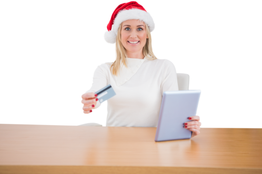 Digital png photo of caucasian woman with santa claus hat, tablet and card on transparent background