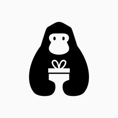 gorilla is holding birthday gift Logo Cartoon Mascot character vector icon illustration © gaga vastard