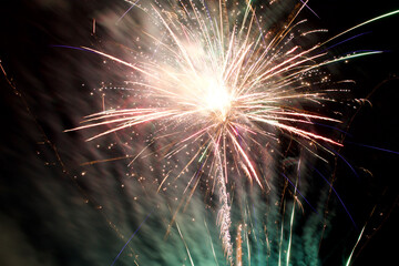 colorful pyrotechnics bursting in the night sky