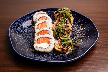 Photo of sushi dish and preparation of sushi for consumption and menu