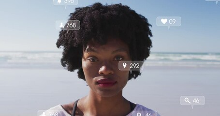 Animation of social media data processing over african american woman on beach - Powered by Adobe