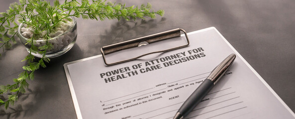 POA  Power of Attorney for health care decisions form on the desk - obrazy, fototapety, plakaty