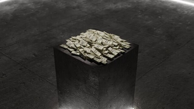 Pile of money on a black block under spotlight
