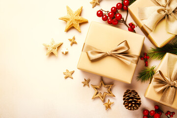 Christmas decoration composition on beige background with gift box , fir branches, pine cones, starfish, red berries,  top view, copy space, banner format