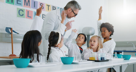 Science, question and students in class with their teacher for learning or to study chemistry. Children, hands raised and education with kids in a laboratory for an experiment of chemical reaction - obrazy, fototapety, plakaty