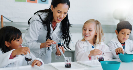 Science, education and children in a classroom with their teacher for learning or to study...