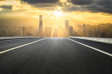 Shenzhen asphalt road and city financial district skyline background
