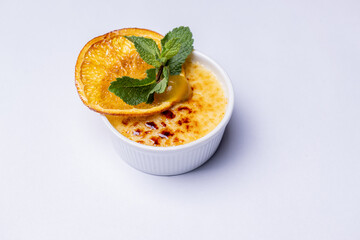 Creme brulee with orange and mint