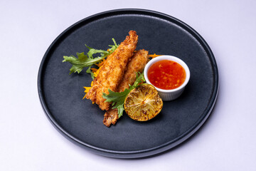 Deep fried tiger prawns with lime and spicy sauce