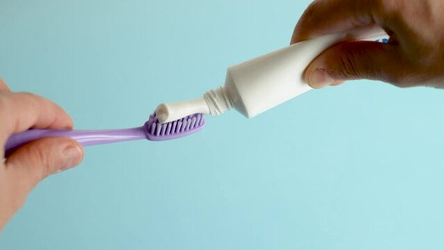 Close up view of toothpaste with toothbrush.