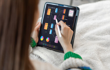 Analyst use laptop working with business analytics and data management system, make a report with...