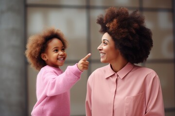 A Young Child and an African American Woman Interacting with Each Other. Fictional characters created by Generated AI.