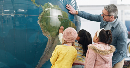 Science, world and students learning about the earth with a teacher at school for growth or...