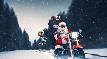 Biker Santa Claus delivering Christmas gifts