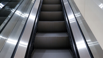 Escalator stairway steps technology for customer use moving up and down comfort transportation in...