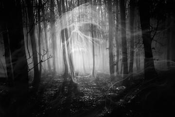 Double exposure of a haunted, dark forest and a scarry figure.