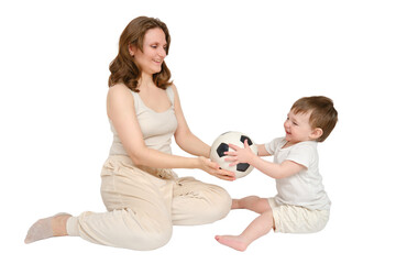 Happy baby with mother play with fotball ball on studio, isolated on white background. Kid about...
