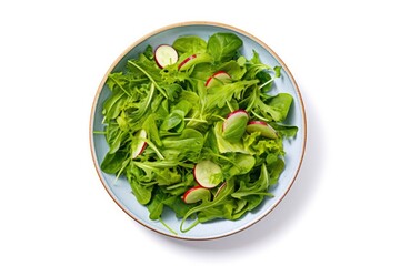 Healthy fresh green salad plate shot from above on white background.