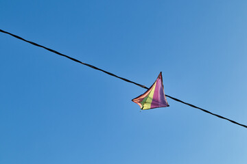 kite stuck in the electric power lines