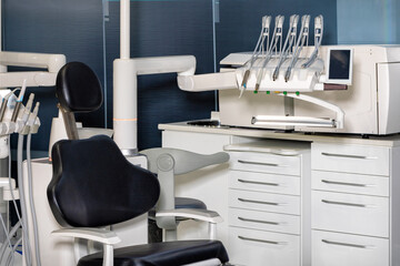 Dentist's office, chair and medical instruments close-up. - 664264283