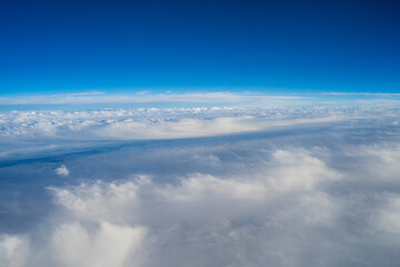 Fototapeta na wymiar a cloud photographed in the sky in an airplane