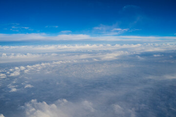 Fototapeta na wymiar a cloud photographed in the sky in an airplane