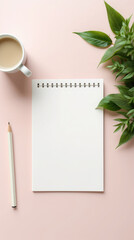 white blank notepad lies on the table, top view, cup of coffee, flowers, plants, space for text, layout, business, office, stationery, sheet of paper, school, work, background, empty page, green - obrazy, fototapety, plakaty