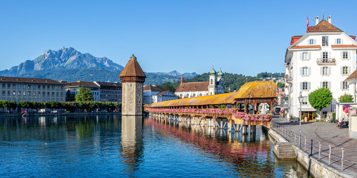 Lucerne city at Reuss river with Kapellbr&uuml;cke and Pilatus mountain panorama in Switzerland