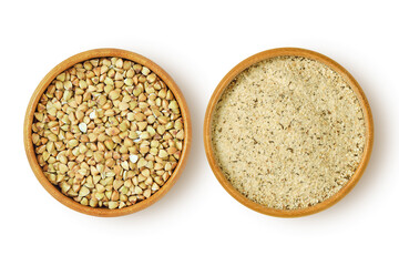 Buckwheat kernels and flour in wooden bowl on white background