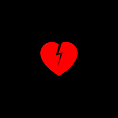 Broken heart icon isolated on black