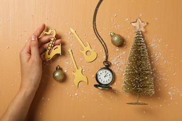 Musical instruments with Christmas tree and clock.