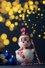 Snowman, Christmas balls, Christmas tree and snow. Christmas background.