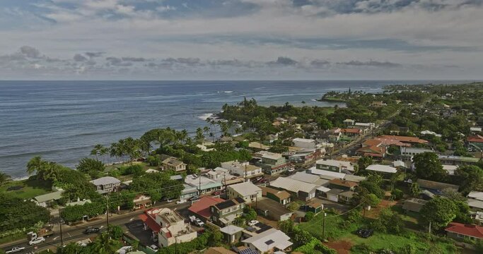 Paia Maui Hawaii Aerial v1 cinematic drone flyover hippie town capturing beautiful Mantokuji Bay, charming seaside residential houses and expansive ocean views - Shot with Mavic 3 Cine - December 2022