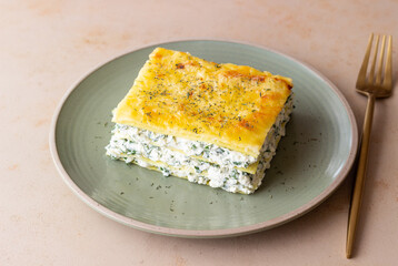 Lasagna with cheese and spinach. Italian food. Vegetarian food.