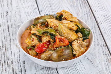 Thai red spicy curry with chicken