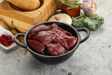 Raw uncooked chicken liver in the bowl
