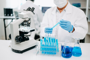 Fototapeta premium Scientist team meeting and writing analysis results in the laboratory study and analyze scientific sample